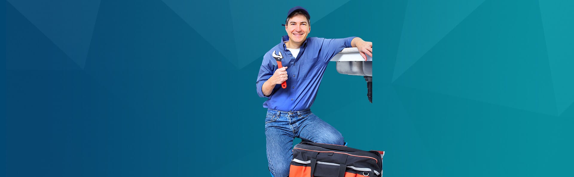 Plumber-Holding-Wrench-Near-A-Sink